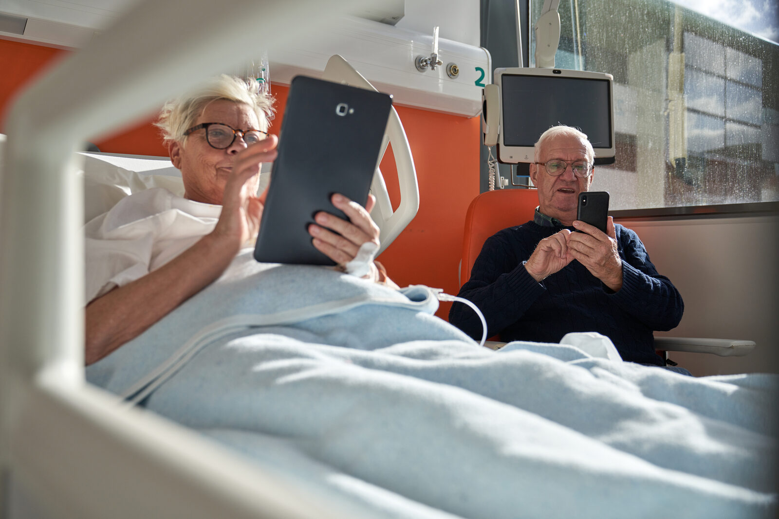 Figure 10.1: Patients using digital devices in a hospital setting.